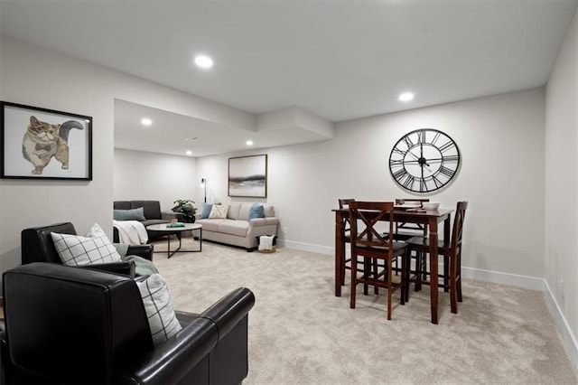 living room featuring light colored carpet