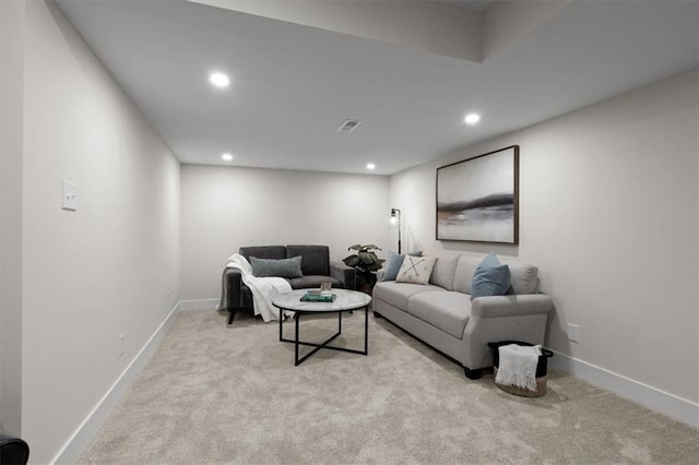 living room featuring light colored carpet