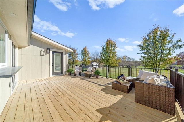 wooden deck featuring an outdoor living space