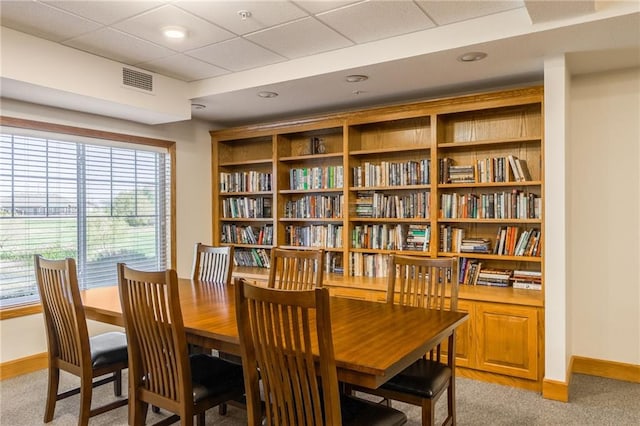 view of carpeted dining space