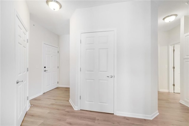 corridor featuring light wood-type flooring