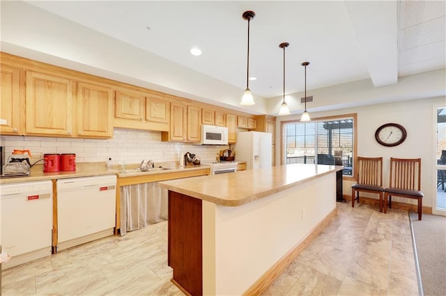 kitchen featuring a kitchen island, sink, backsplash, hanging light fixtures, and white appliances