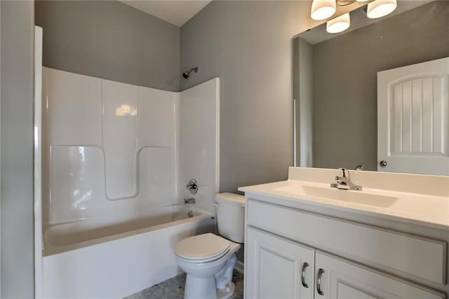 bathroom with toilet, vanity, and washtub / shower combination