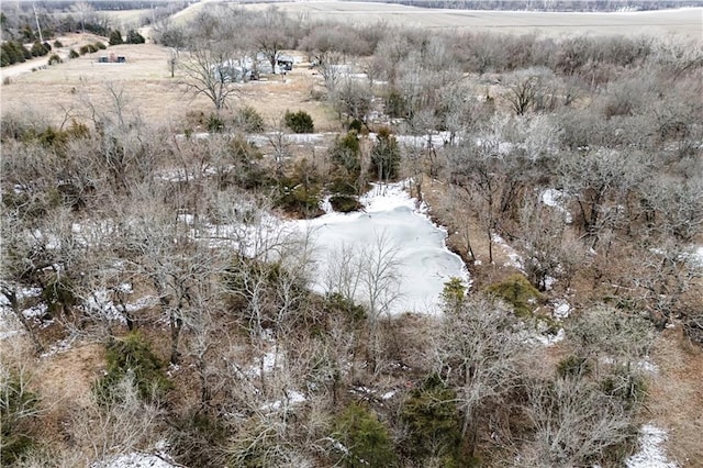 birds eye view of property with a rural view