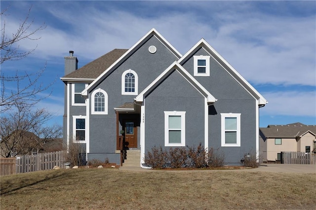 view of front property featuring a front yard