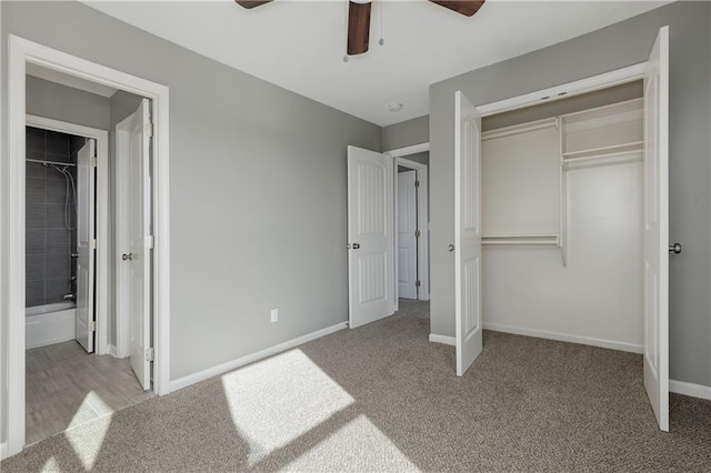 unfurnished bedroom with light colored carpet, a closet, and ceiling fan