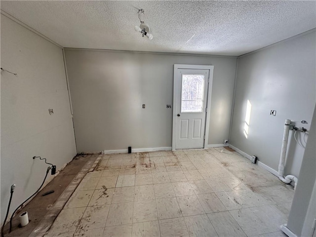 entrance foyer with a textured ceiling