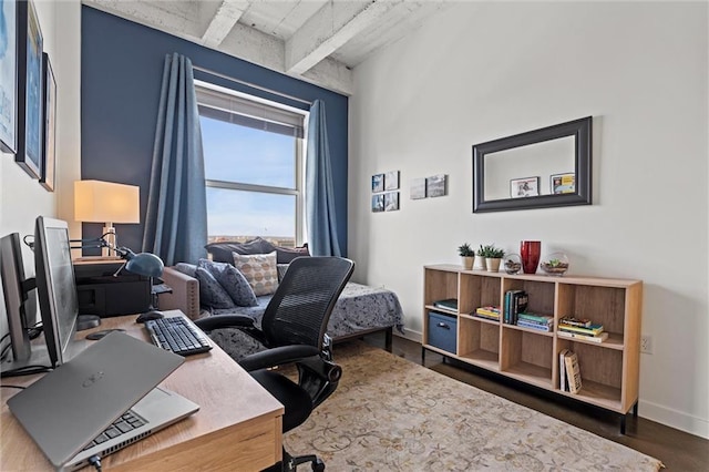 office featuring wood finished floors and baseboards