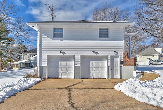 exterior space featuring a garage