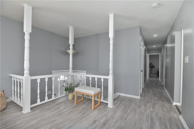 hallway featuring light hardwood / wood-style flooring