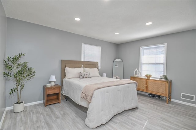 bedroom with wood-type flooring