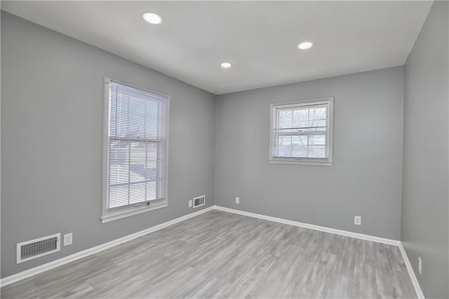 empty room featuring light hardwood / wood-style flooring