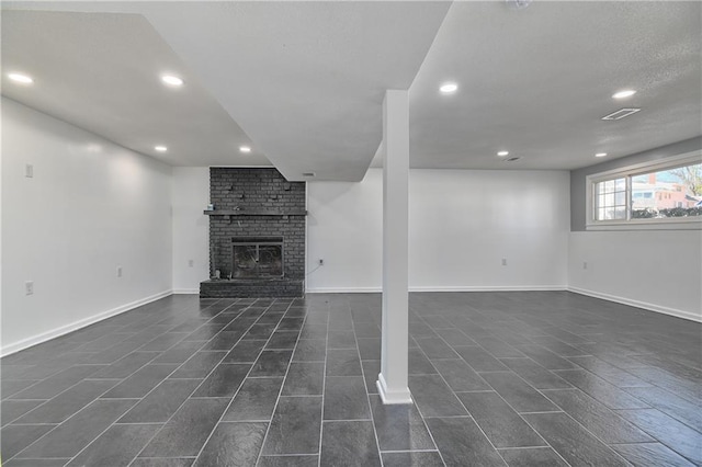 unfurnished living room featuring a brick fireplace