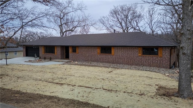 single story home with a garage