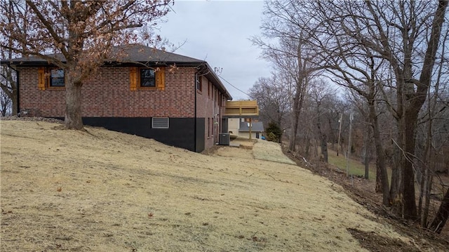 view of home's exterior featuring central air condition unit