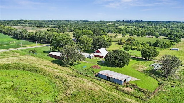 birds eye view of property featuring a rural view