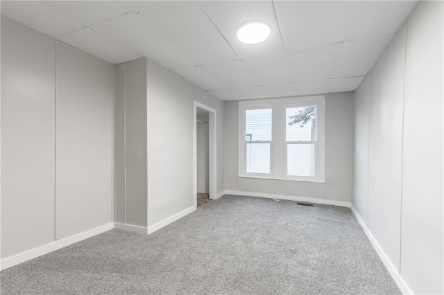 unfurnished room featuring carpet floors