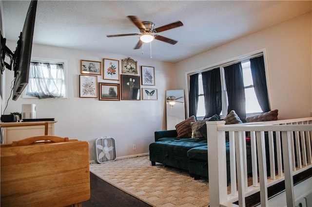 bedroom featuring ceiling fan and hardwood / wood-style floors