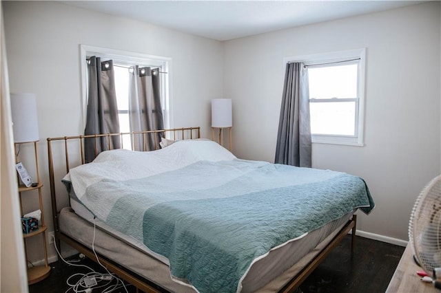 bedroom featuring dark hardwood / wood-style flooring