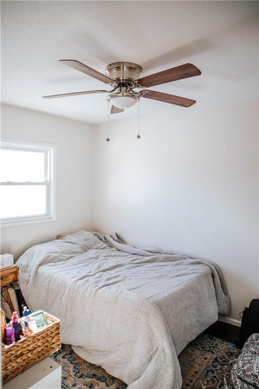 bedroom featuring ceiling fan