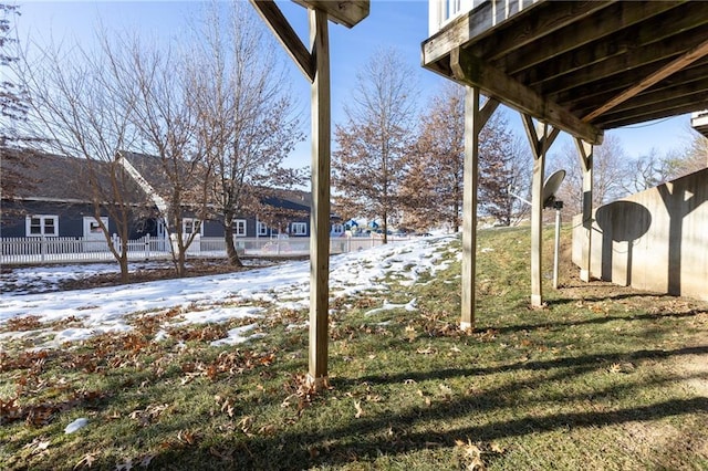 view of yard covered in snow