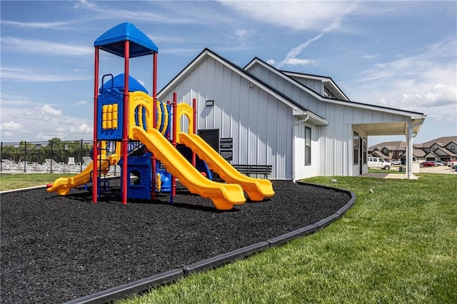 view of play area featuring a lawn