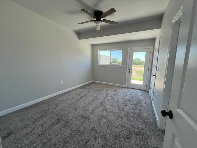 carpeted empty room with ceiling fan