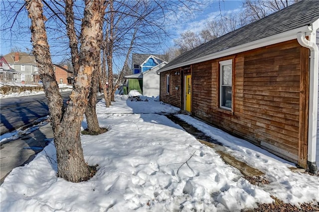 view of snow covered property