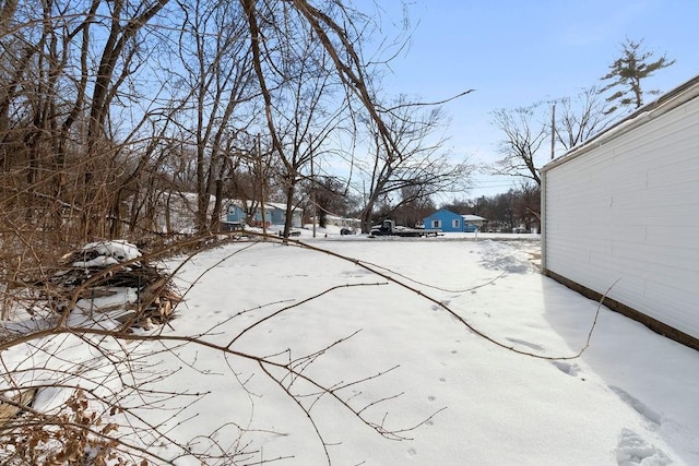 view of snowy yard