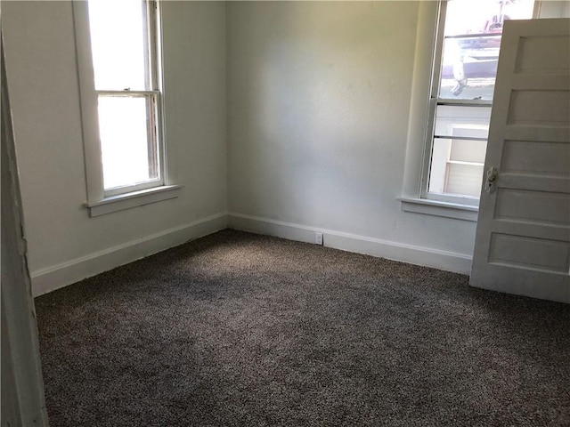 spare room with carpet flooring