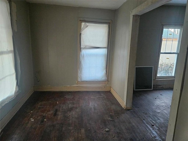 empty room featuring dark hardwood / wood-style floors