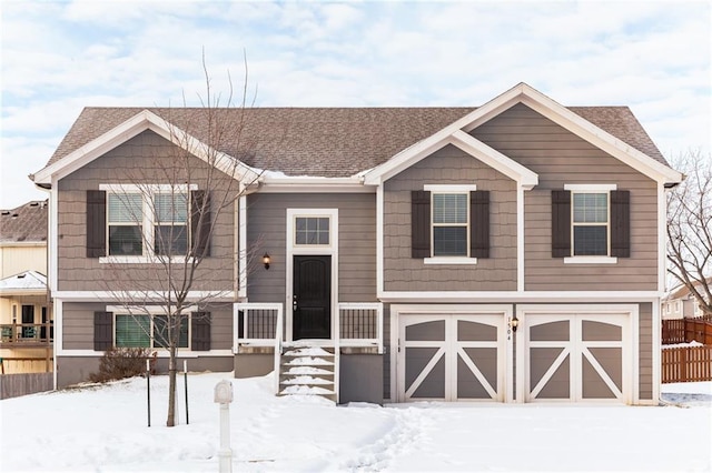 split foyer home featuring a garage