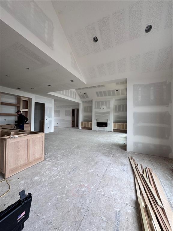 unfurnished living room with a fireplace