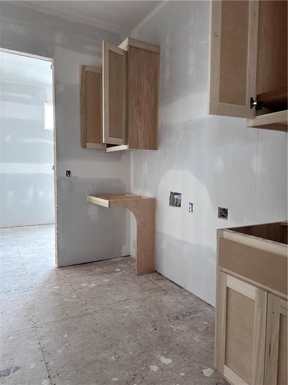 kitchen featuring light brown cabinets