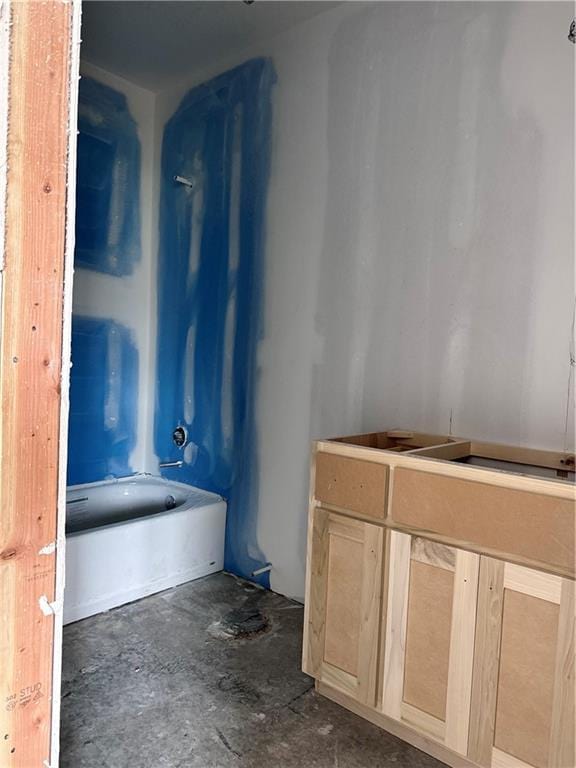 bathroom with a bathing tub