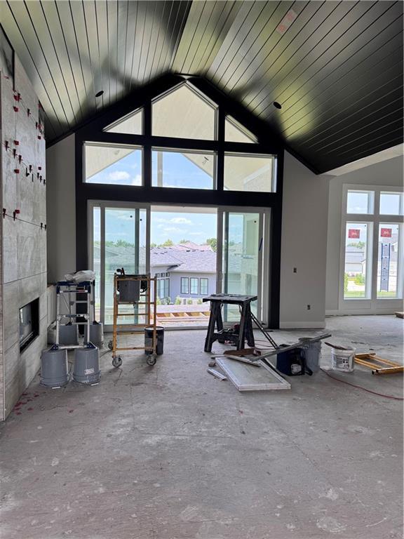 4600 W 157th St, Overland Park, KS 66224 - living area with high vaulted ceiling and a tiled fireplace