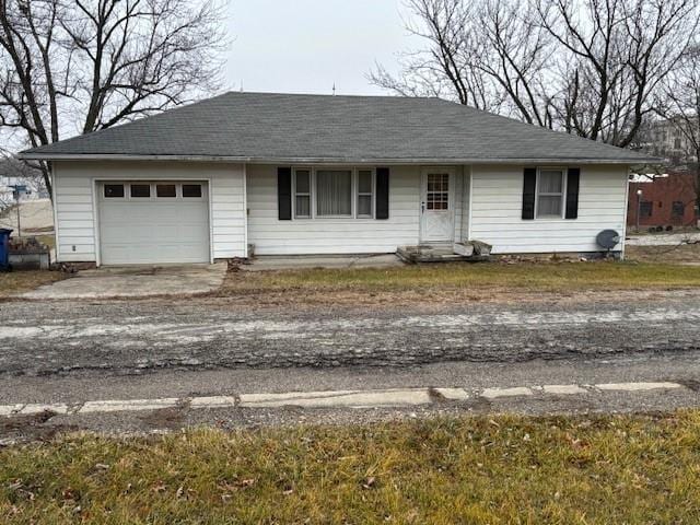 single story home with a garage