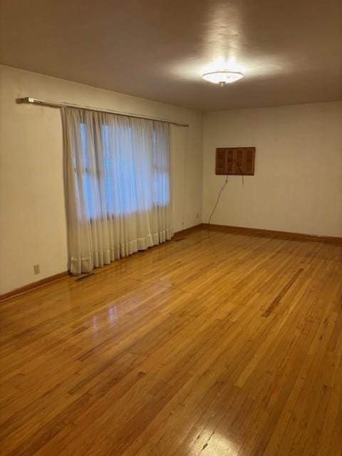 empty room with light wood-type flooring