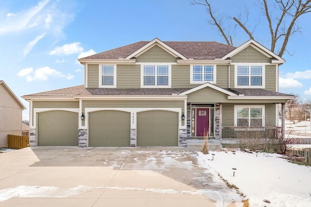 view of front of property featuring a garage