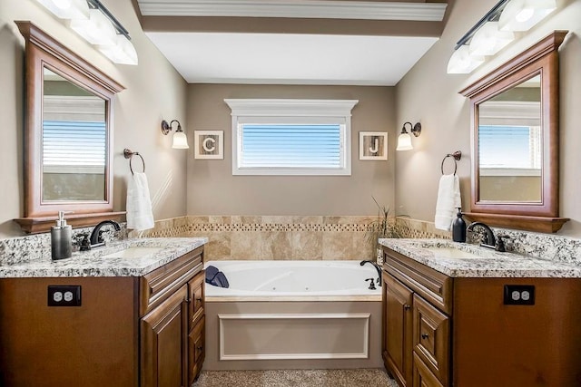 bathroom featuring vanity and a wealth of natural light