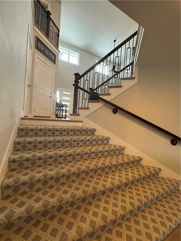 stairs with a high ceiling