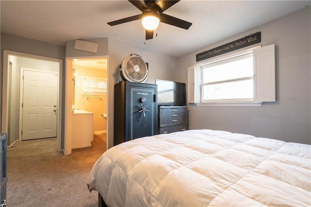 carpeted bedroom featuring ceiling fan and connected bathroom