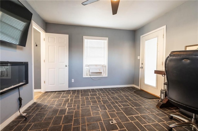 office area featuring ceiling fan and cooling unit