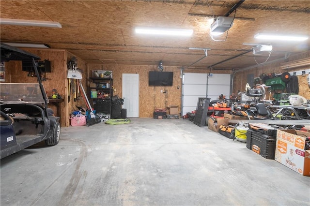 garage featuring a garage door opener