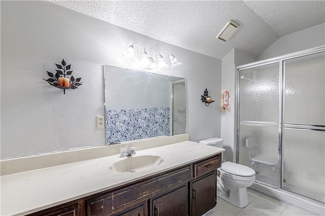 9215 E 85th St, Raytown, MO 64138 - full bath with toilet, a textured ceiling, a shower stall, and tile patterned flooring