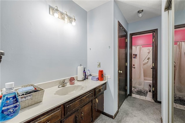 9215 E 85th St, Raytown, MO 64138 - bathroom with a textured ceiling, vanity, and baseboards