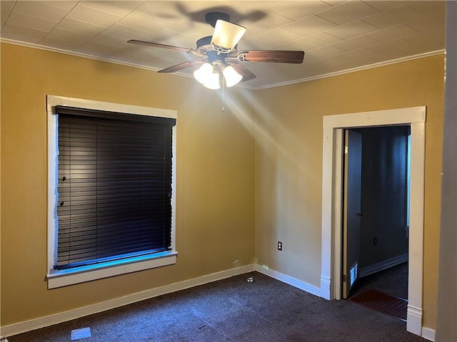 bonus room featuring ceiling fan and dark carpet