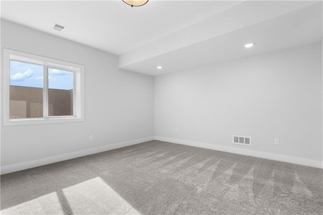 unfurnished room featuring carpet flooring