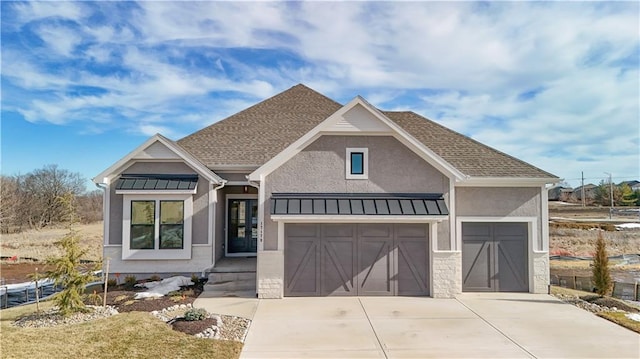 craftsman-style home with a garage