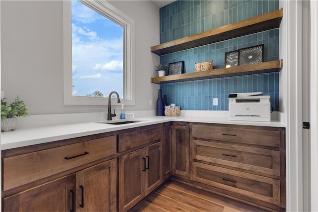 17186 S Heatherwood St, Olathe, KS 66062 - kitchen featuring a sink, backsplash, open shelves, and light countertops